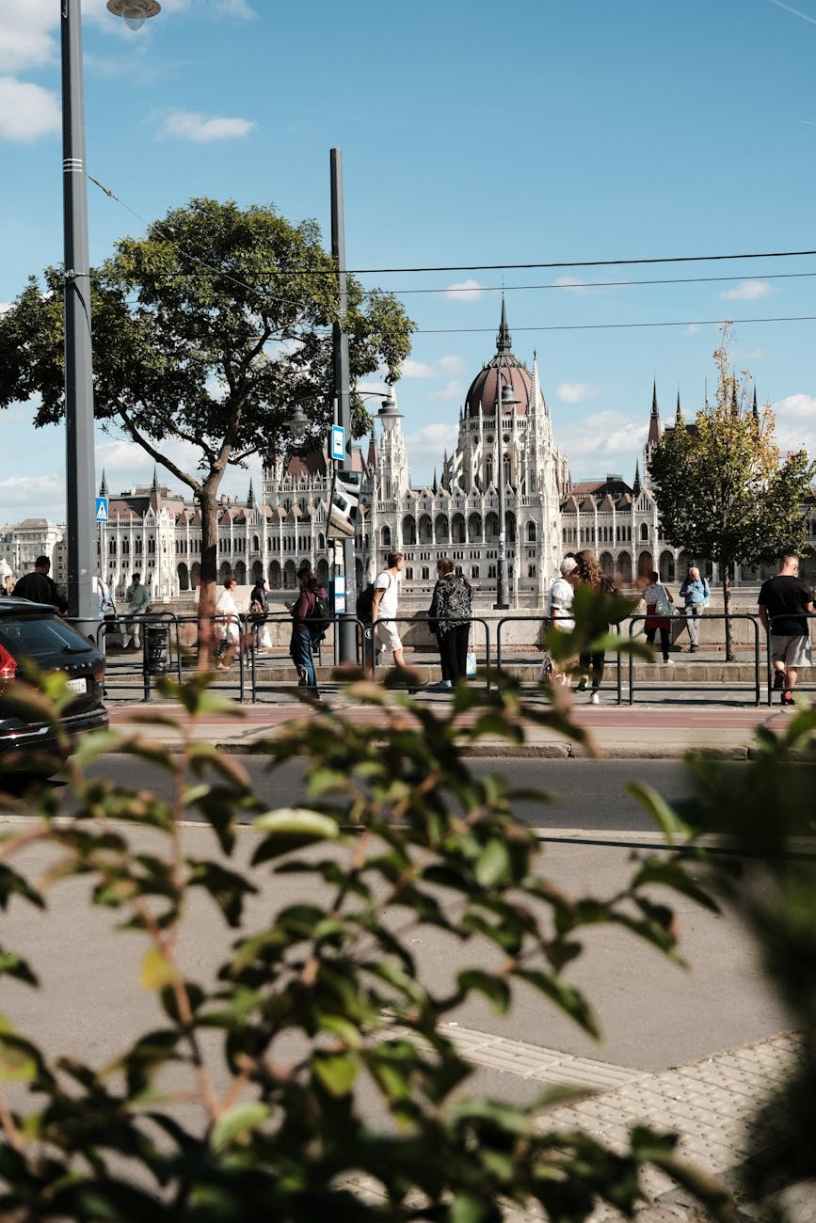 a city with a large building in the background