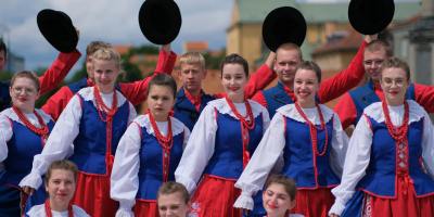 group in traditional polish folk costumes outdoors